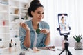 Professional Beauty Blogger Woman Using Smartphone Making Video Indoors Royalty Free Stock Photo