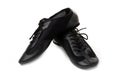 Professional black ballet shoes for jazz dance on a white background Royalty Free Stock Photo