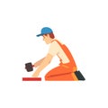 Professional Builder with Rubber Mallet, Male Construction Worker Character in Orange Overalls and Blue Cap with Royalty Free Stock Photo