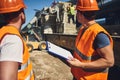 Two workers turning their heads and looking at the coworkers