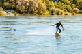 Professional bungee surfer Sebastian Dessecker bungee surfing on the Rhine near Bad Saeckingen