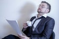 Professional burnout concept.  Tired and overworked businessman sleeping at his working place Royalty Free Stock Photo