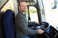 Professional bus driver at steering wheel Royalty Free Stock Photo