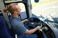 Professional bus driver at steering wheel Royalty Free Stock Photo