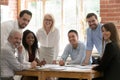Professional business team young and old people posing at table Royalty Free Stock Photo