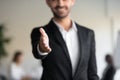 Professional businessman hr salesman wear suit extending hand at camera Royalty Free Stock Photo