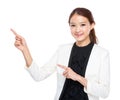 Professional businesswoman with two finger point aside Royalty Free Stock Photo