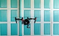 Professional camera drone flying. Royalty Free Stock Photo