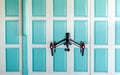 Professional camera drone flying. Royalty Free Stock Photo
