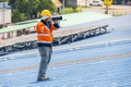 professional camera man working in dangerous workplace photograph at industry workplace outdoors Royalty Free Stock Photo