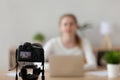 Professional camera shooting female filming tutorial at home Royalty Free Stock Photo