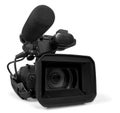 Professional video camera on white background Royalty Free Stock Photo
