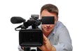 A professional cameraman operating a video camera Royalty Free Stock Photo