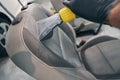 Close-up detailed vacuum of leather seats in auto center. Detailing Royalty Free Stock Photo