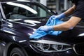 Professional car interior cleaning service with unrecognizable person on a sunny summer day