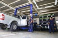 Professional car mechanic, tire change Royalty Free Stock Photo