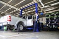 Professional car mechanic, tire change Royalty Free Stock Photo