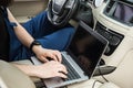 Professional car mechanic working in auto repair service. Computer video investigate. Engine diagnostics. Service Royalty Free Stock Photo