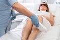 Professional care for her beauty, where a woman undergoes photoepilation procedure in clinic, giving her skin flawless