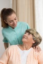 Professional carer nursing senior lady Royalty Free Stock Photo