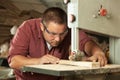 Professional carpenter working with sawing machine. Royalty Free Stock Photo