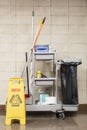 Professional cart for cleaning and portable poster caution wet f Royalty Free Stock Photo