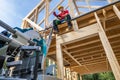 Professional Caucasian Wooden House Skeleton Frame Contractor Worker Royalty Free Stock Photo