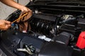 Professional check engine oil details and cleaning