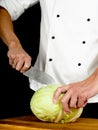 Professional chef holding a sharp cooking knife Royalty Free Stock Photo