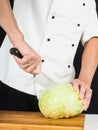 Professional chef holding a sharp cooking knife Royalty Free Stock Photo