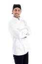 Professional chef looking at camera standing