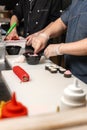 A professional chef punishes rolls with mayonnaise and caviar Royalty Free Stock Photo