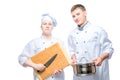 professional chefs with kitchen utensils on a white Royalty Free Stock Photo