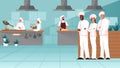 Professional chefs standing together in the restaurant kitchen. Royalty Free Stock Photo