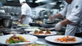 Professional Chefs Working in a Busy Restaurant Kitchen. Resplendent. Royalty Free Stock Photo