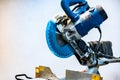 A professional circular saw with a miter in the woodcraft carpentry workshop. Royalty Free Stock Photo