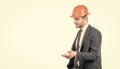 Professional civil engineer in hardhat and suit gesticulating, engineering Royalty Free Stock Photo