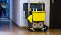 Professional cleaning equipment in corridor.