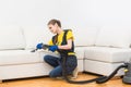 Professional cleaning service. Two women in working uniform, in aprons. Two women in working uniform, in aprons, divide