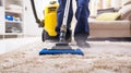 Professional cleaning service vacuuming a shag rug. Close-up of vacuum cleaner in action on soft carpet. Concept of home Royalty Free Stock Photo