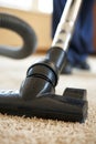 Professional cleaning team vacuuming busy office building for commercial services