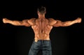 Professional coach demonstrate achievements. Exercises for back. Bodybuilder perfect shape rear view. Strong bodybuilder