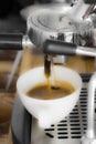 Professional coffee machine making espresso in a cafe, concept b Royalty Free Stock Photo