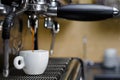 Professional coffee machine making espresso