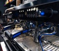 Professional coffeemaking machine. Close up view of barista making coffee. Royalty Free Stock Photo