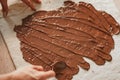 Professional confectioner making tasty cake with melted chocolate Royalty Free Stock Photo