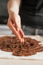 Professional confectioner making tasty cake with melted chocolate Royalty Free Stock Photo