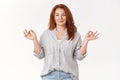 Professional confident mom feel relaxed self-assured unworried. Happy carefree redhead middle-aged woman stay patient Royalty Free Stock Photo