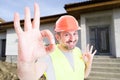 Professional construction services concept with cheerful builder Royalty Free Stock Photo