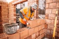 Professional construction worker building house Royalty Free Stock Photo